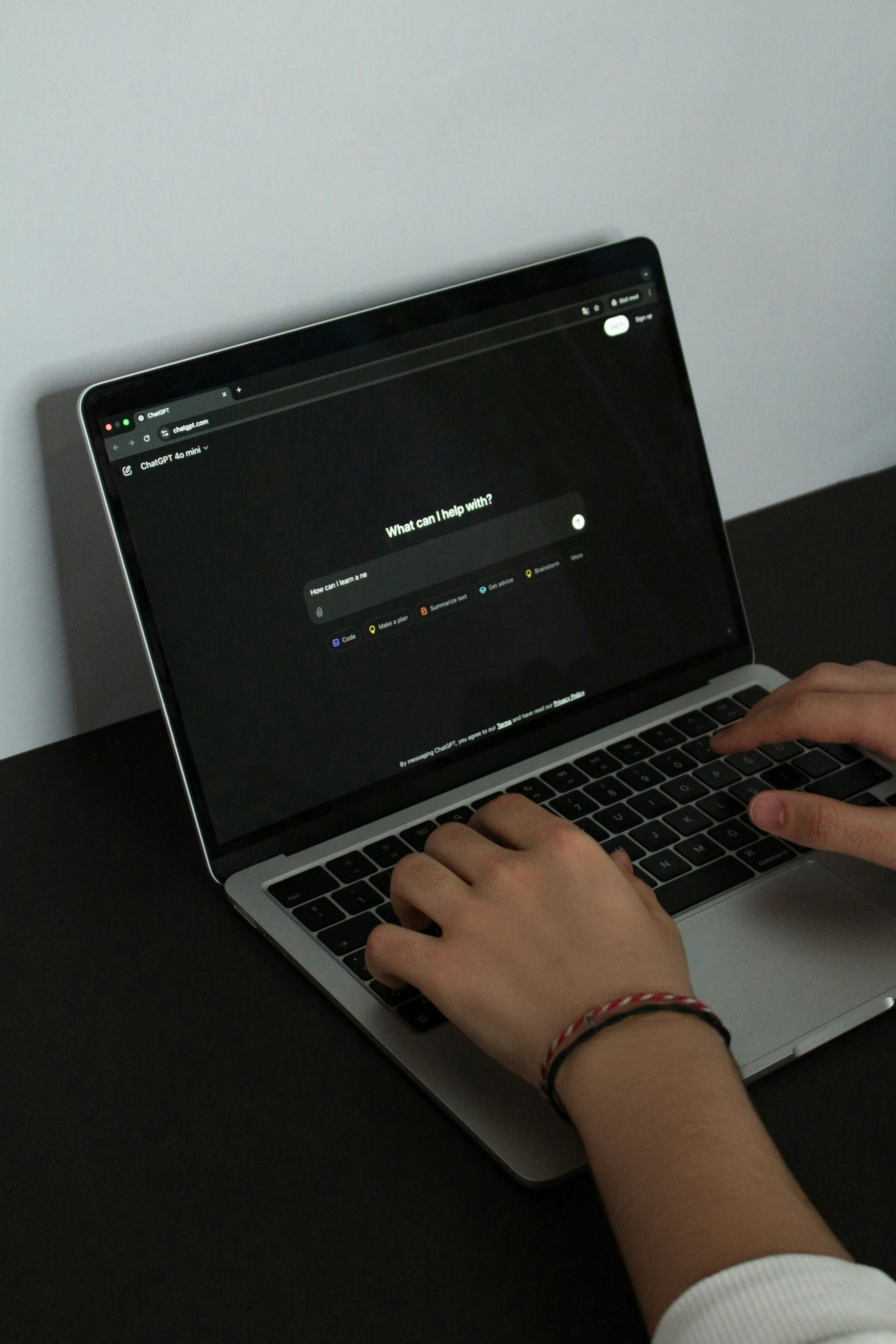 Person typing on laptop showing Copilot dashboard