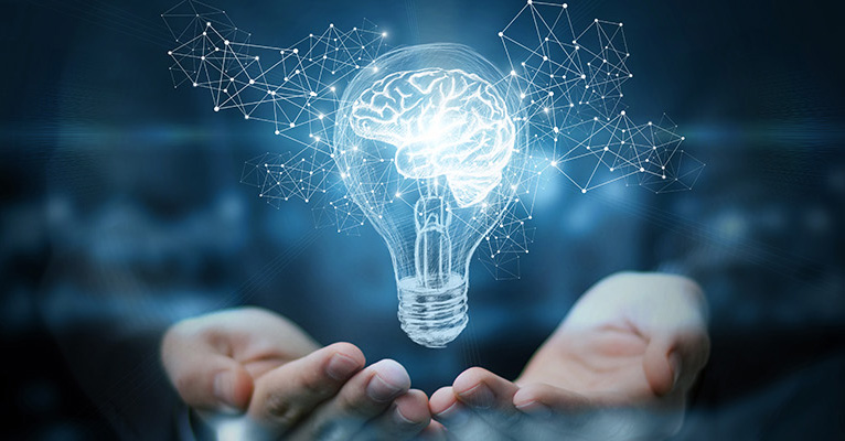 Digital brain lightbulb above hands