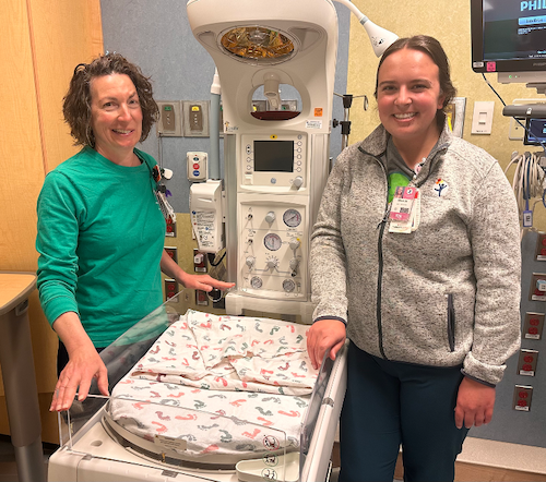Chara Kurtz RN (left) in the Children’s Colorado NICU with Bricelyn Carrick RN
