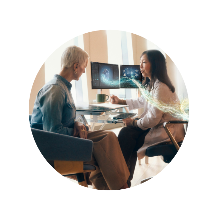 Doctor talking to patient at a desk
