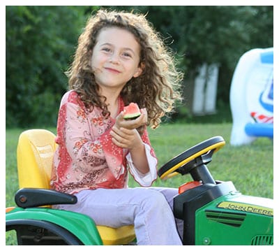 Avielle With a Tractor