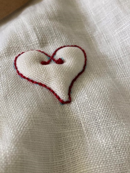 Heart stitched in linen