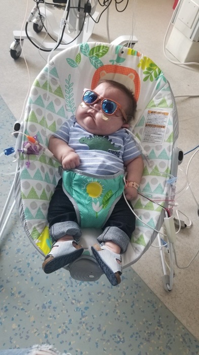 baby in rocker