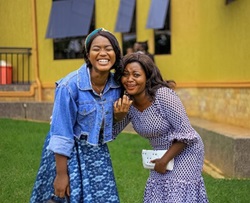 Two women laughing together Two women laughing together