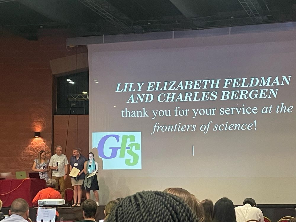 Lily Feldman receiving award for service in the frontiers of science