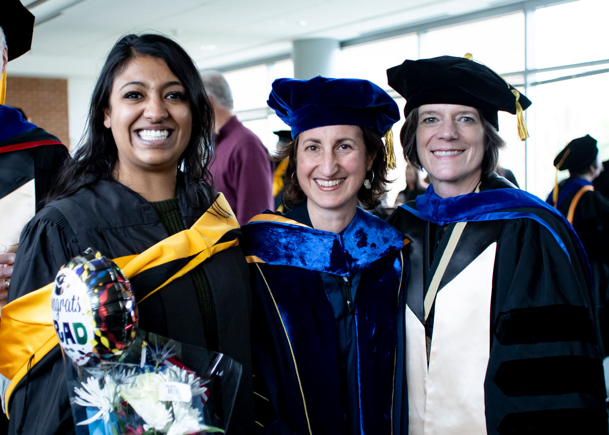 Graduate students in cap and gowns