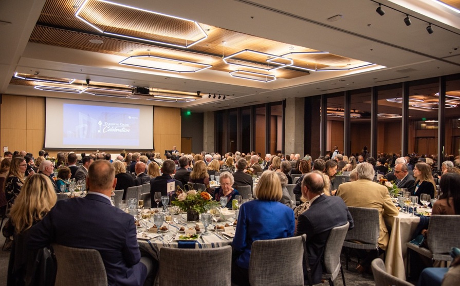 Guests at the 2025 Endowed Chair Celebration enjoying the main evening program in the Elliman Conference Room.