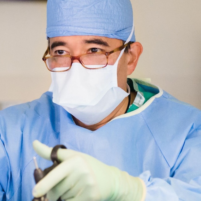 Doctor in a mask in surgery