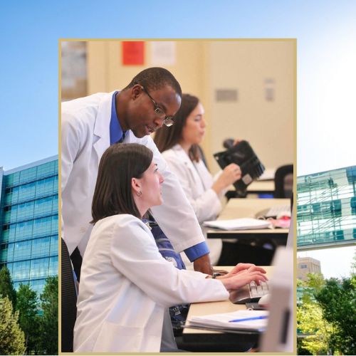CU Anschutz School of Medicine students in white lab codes engaged in active learning.