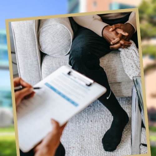 SOC GA Article Feature Image Honnen A mental health expert holds a clipboard while speaking to a patient sitting on a couch.