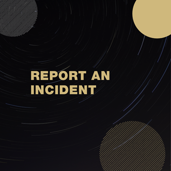 Black box with partial gold and silver circles with the words Report an Incident