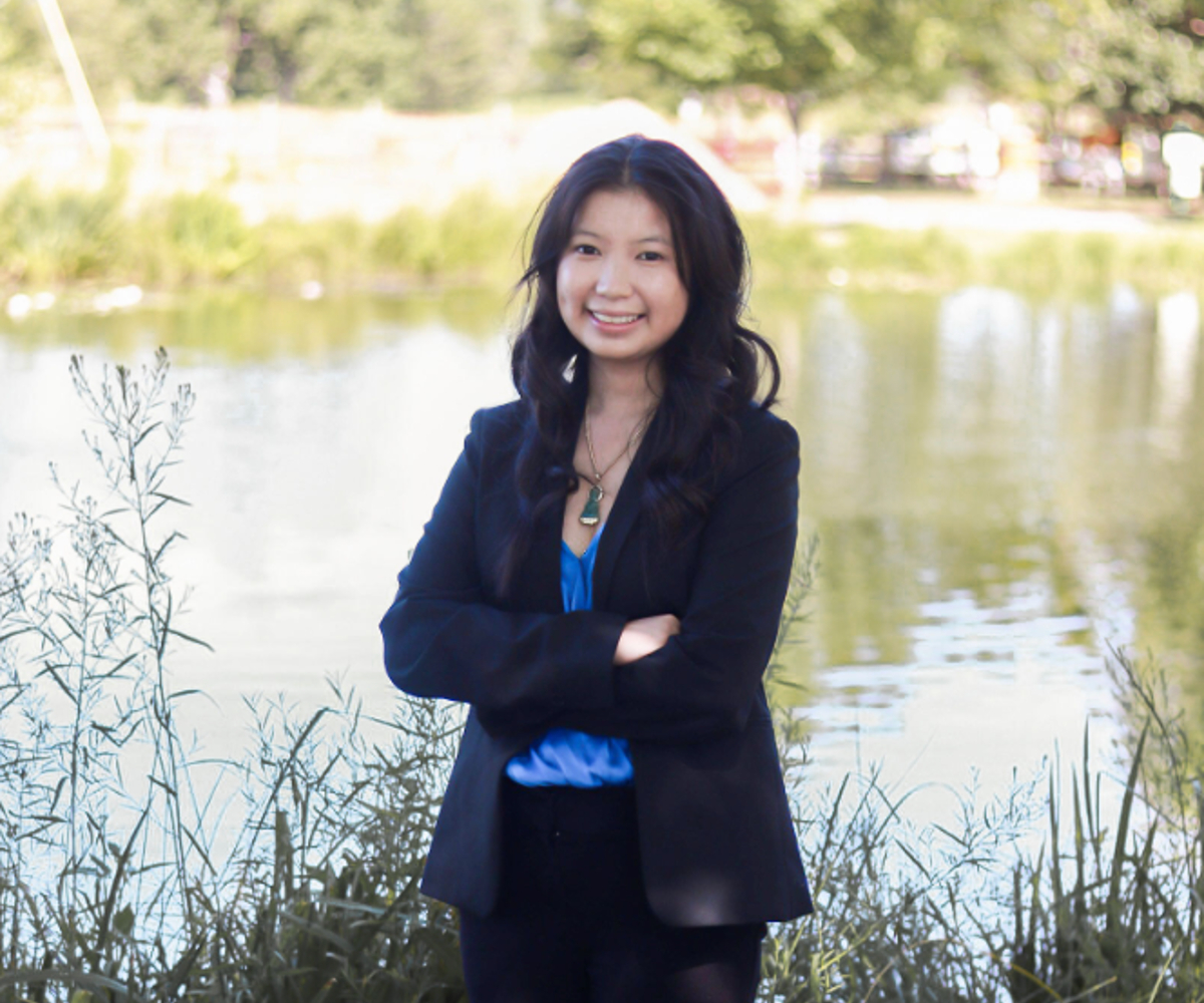 Kimmy Van posed in front of a lake