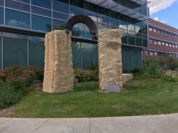 The Arch of Cosmos and Damian Sculpture