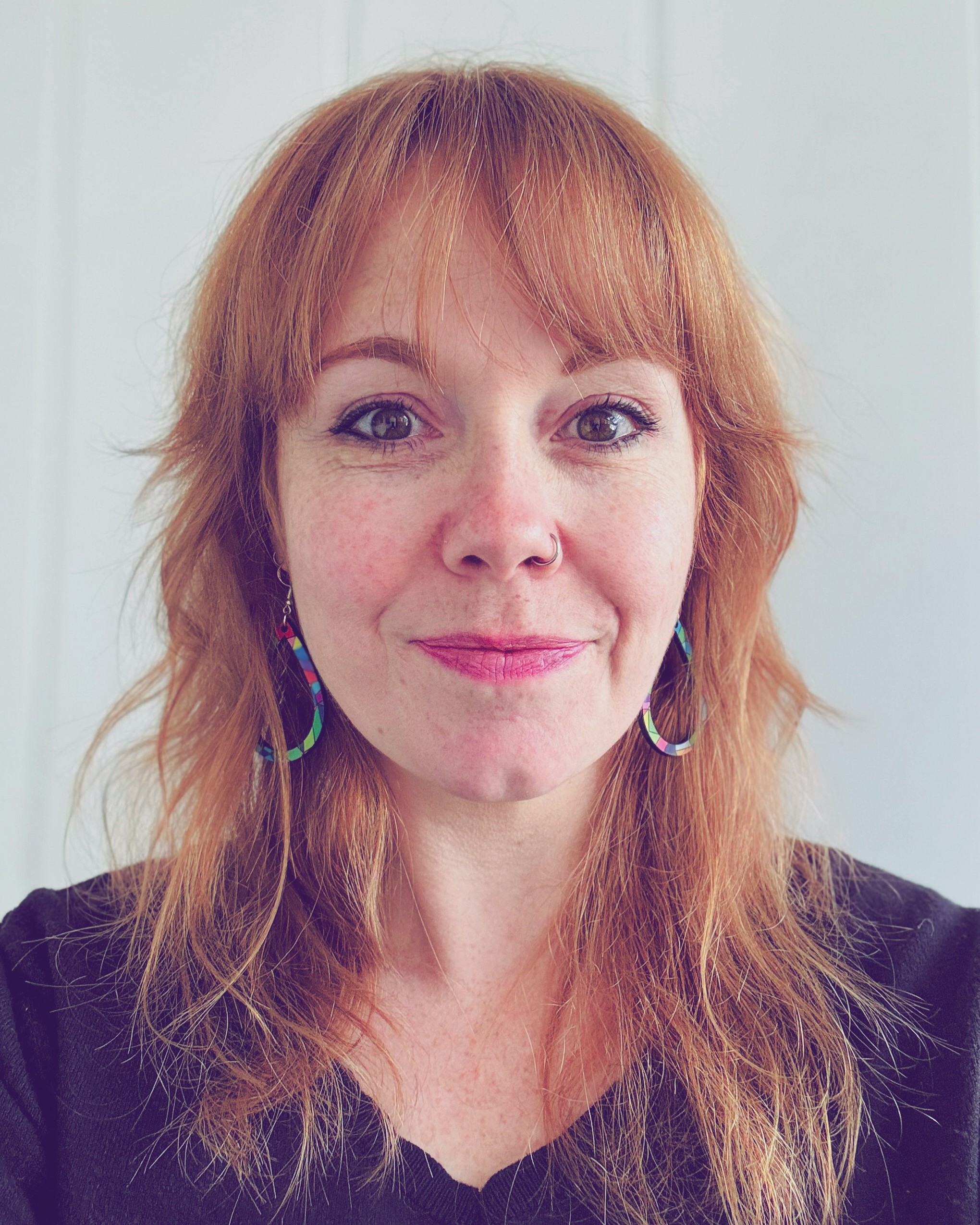 Head shot of Tessa Carlson in front of a white background