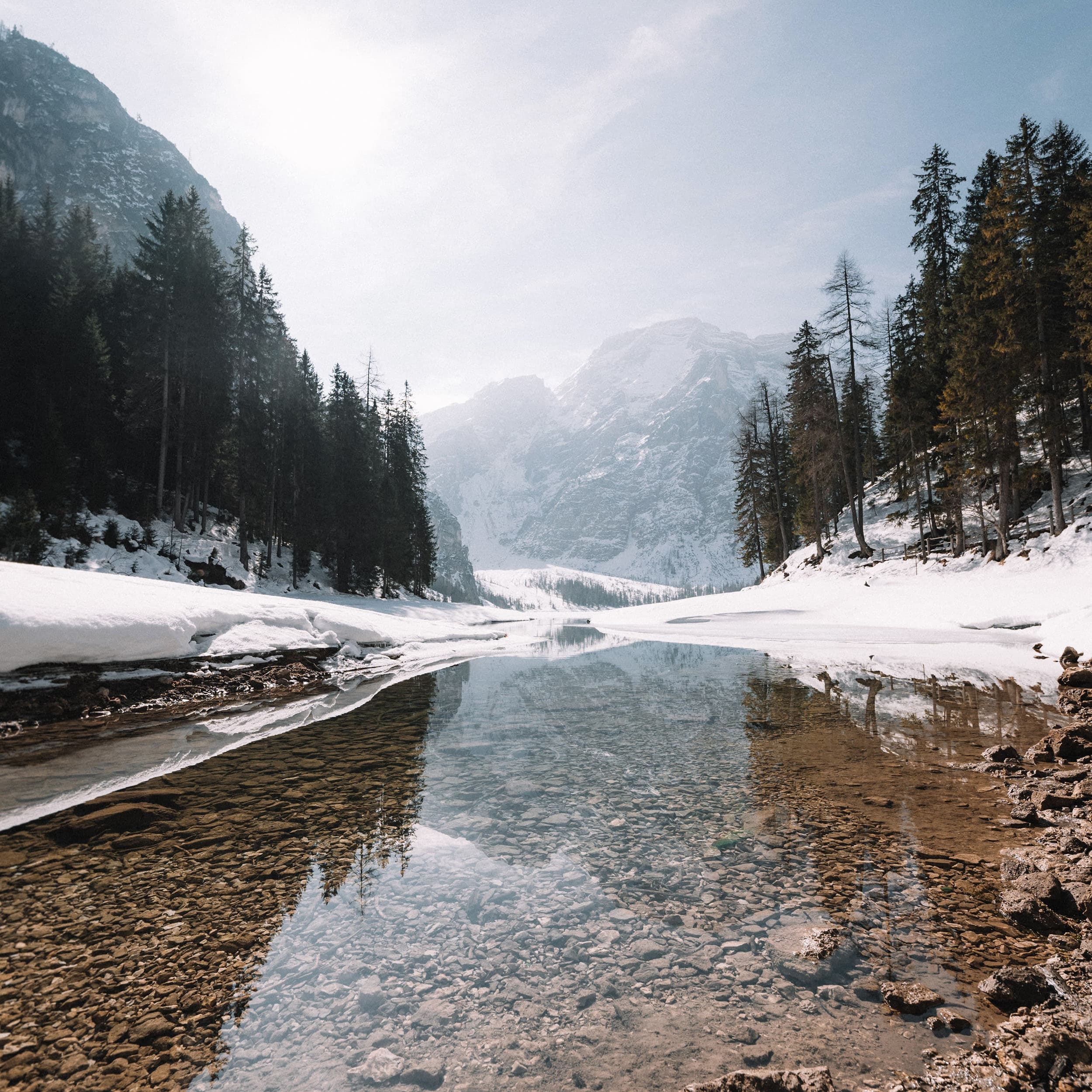 A calm, rocky mountain stream in Winter.