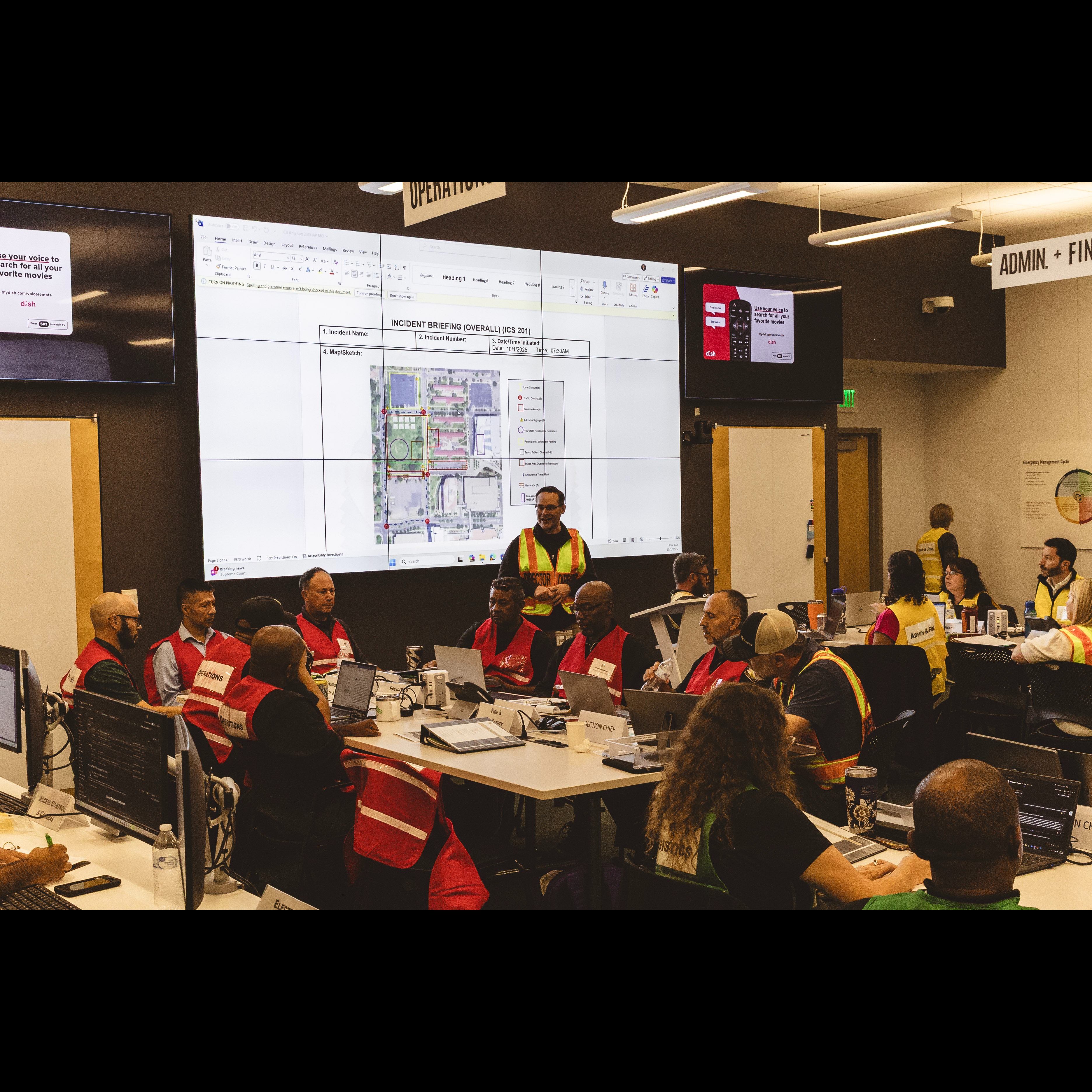 Team members working in the Emergency Operations Center
