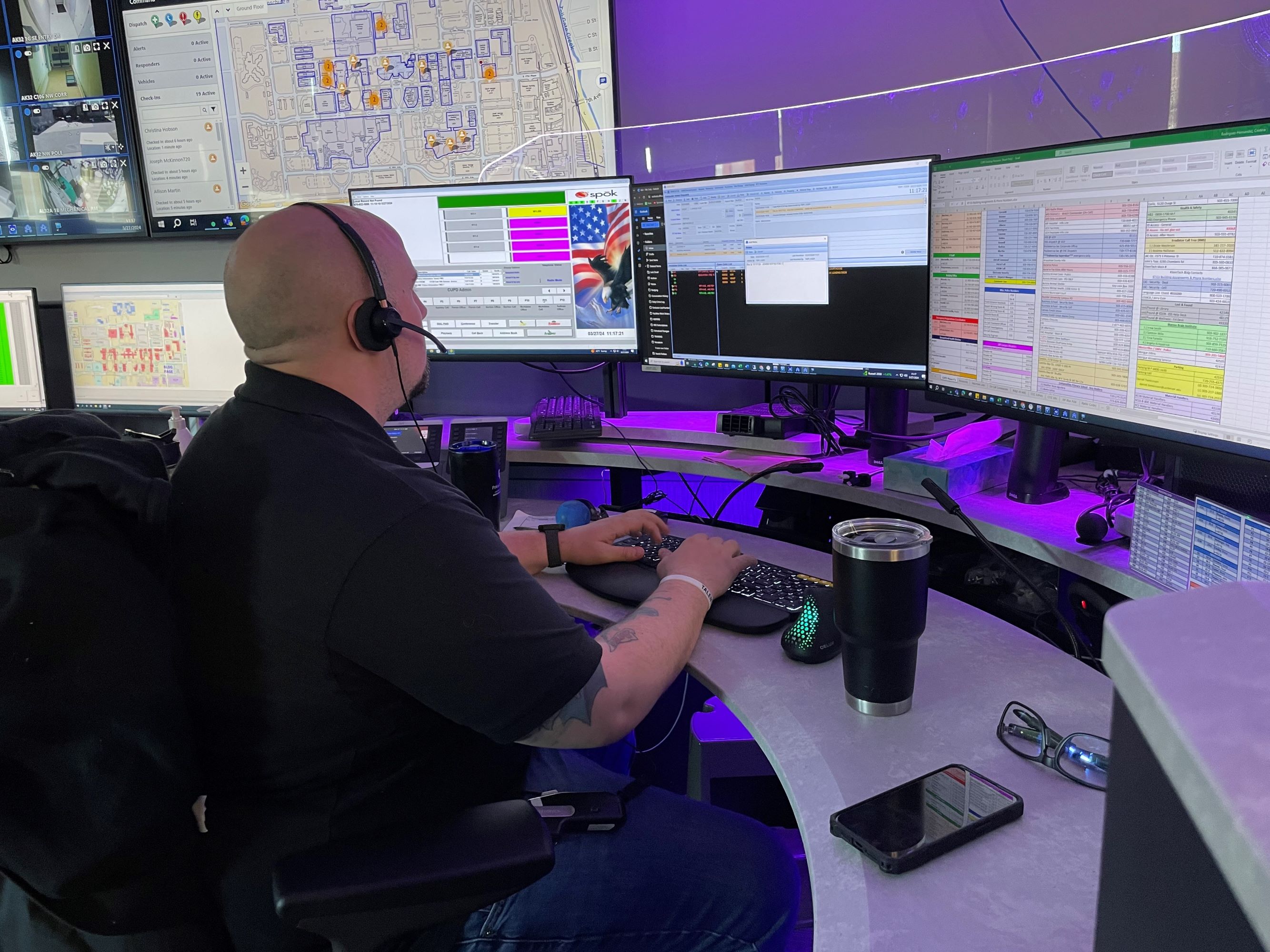 Dispatcher Toft at desk working on computer