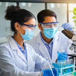 Firefly researchers learning in a laboratory with the concept of genetic research 41253 Adobe Firefly generated image with researchers learning in a lab