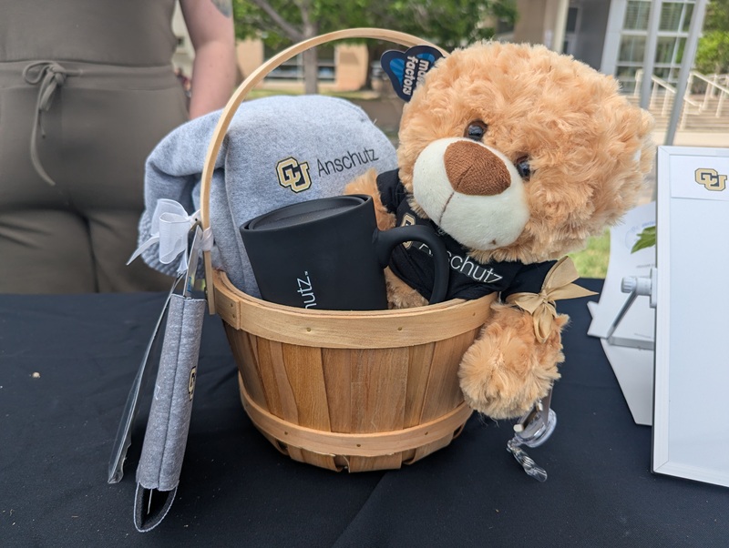 Prize basket with CU Anschutz branded items.