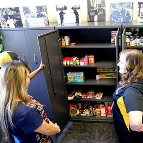 Office of Student Services personnel take stock of the CU Anschutz student food pantry.